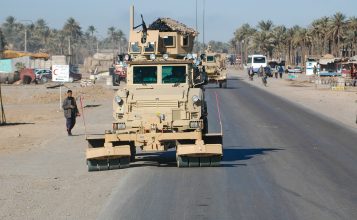 Ground-engaging wheels on a Self Protection Roller are ahead of the vehicle to detonate the threat before the vehicle wheels reach it.