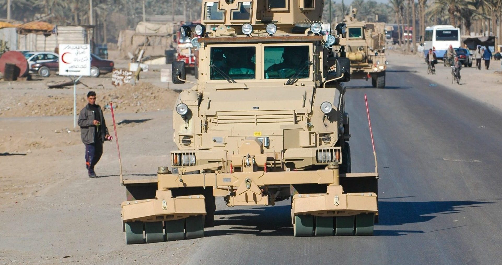 Ground-engaging wheels on a Self Protection Roller are ahead of the vehicle to detonate the threat before the vehicle wheels reach it.